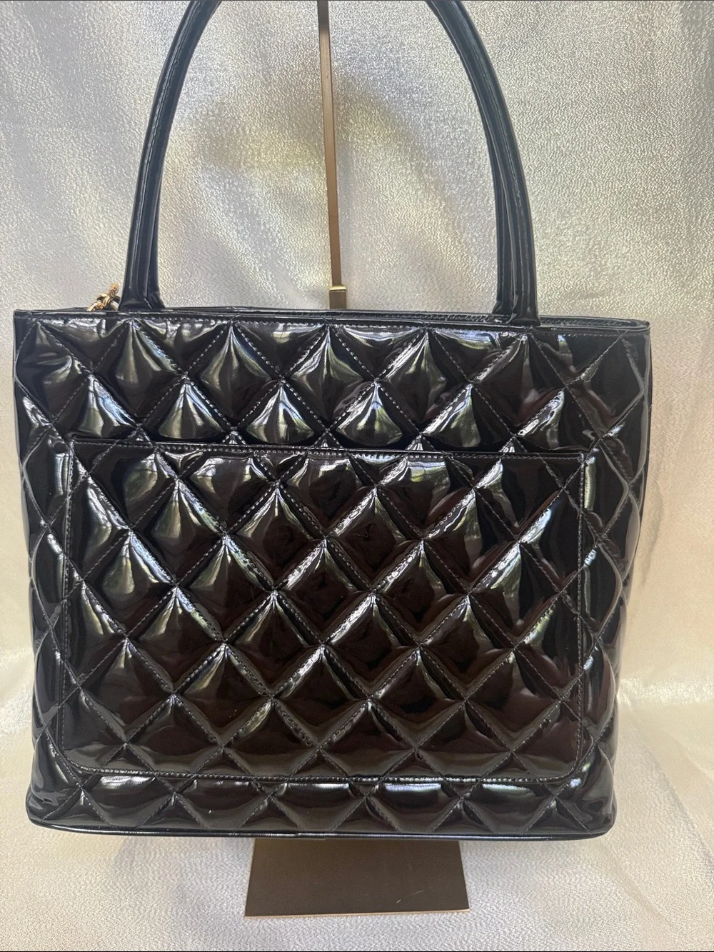 CHANEL glossy black